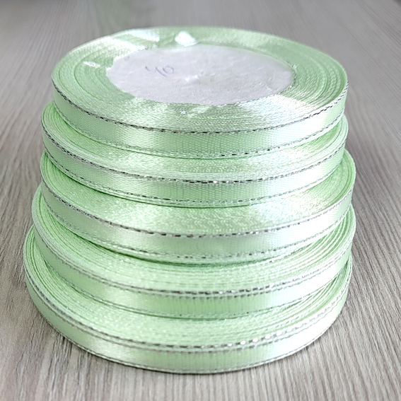 Атласная лента 0,6 см светло-салатовый/серебро (бабина) — изображение 1